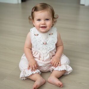 NWT This exclusive piece is a part of the Frilly Frocks collection by Haute Baby
